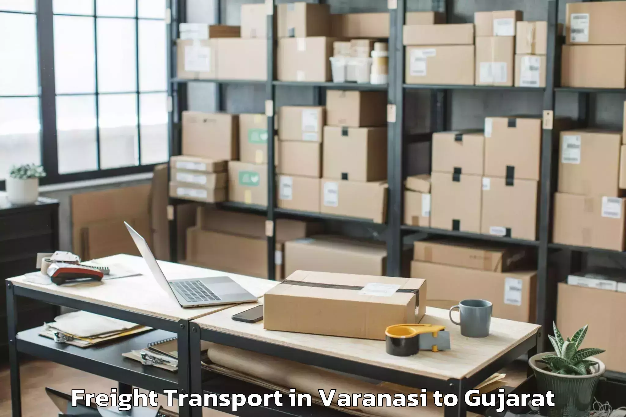 Affordable Varanasi to Malpur Freight Transport